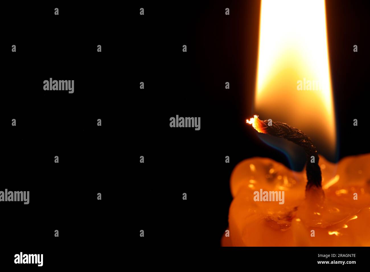 Burning candle on black background, closeup. Space for text Stock Photo ...