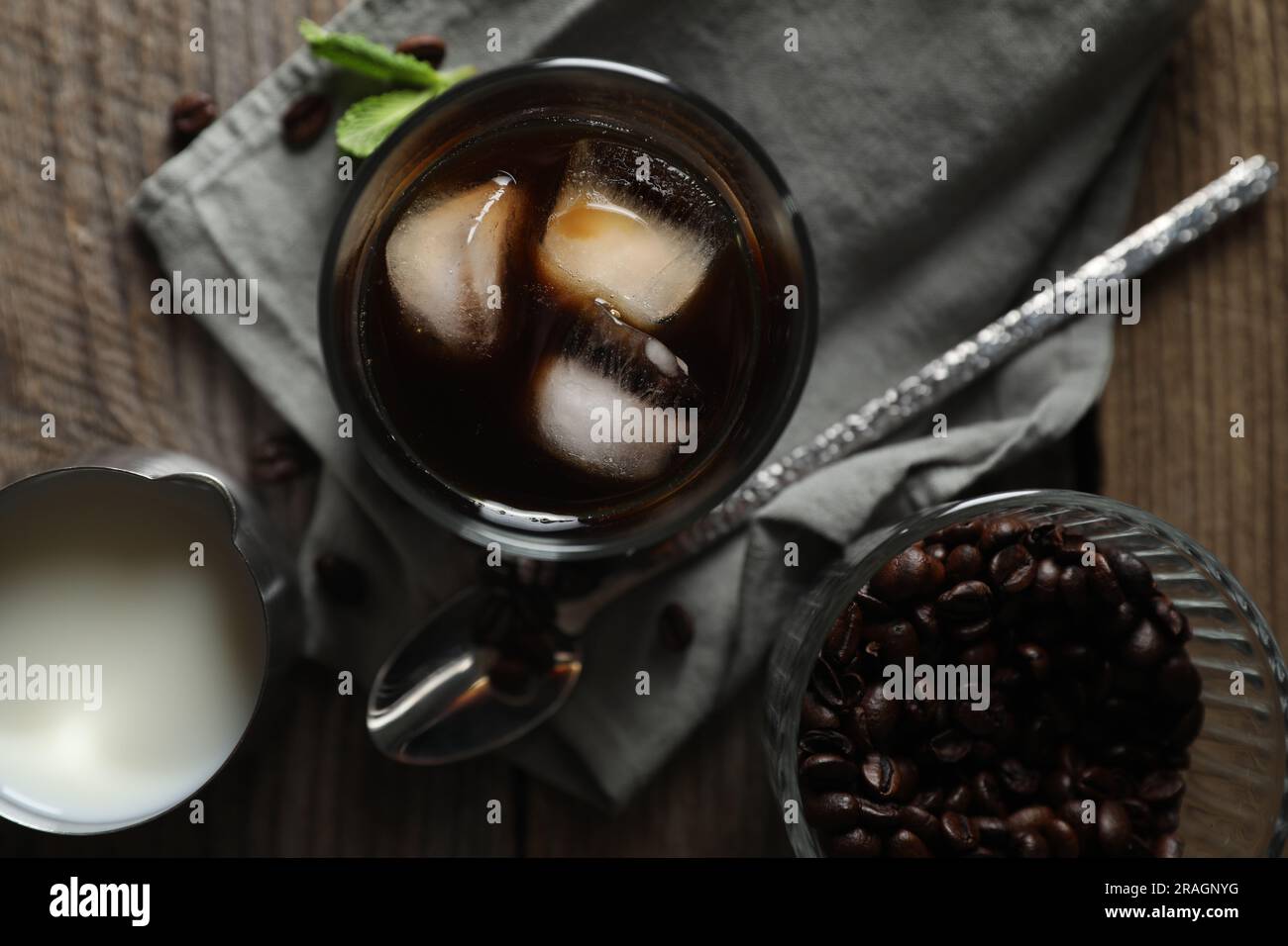 Ice cubes made with coffee in blue ice cube tray to prepare refreshing  coffee drinks like iced coffee. White background, view from above, isolated  Stock Photo - Alamy