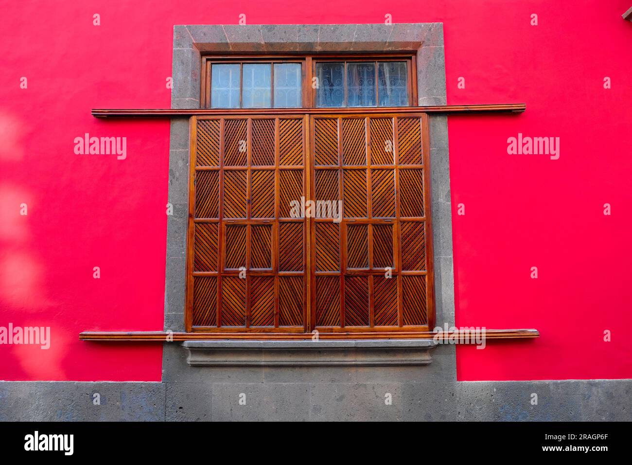 A big window with wooden closed shutters Stock Photo - Alamy