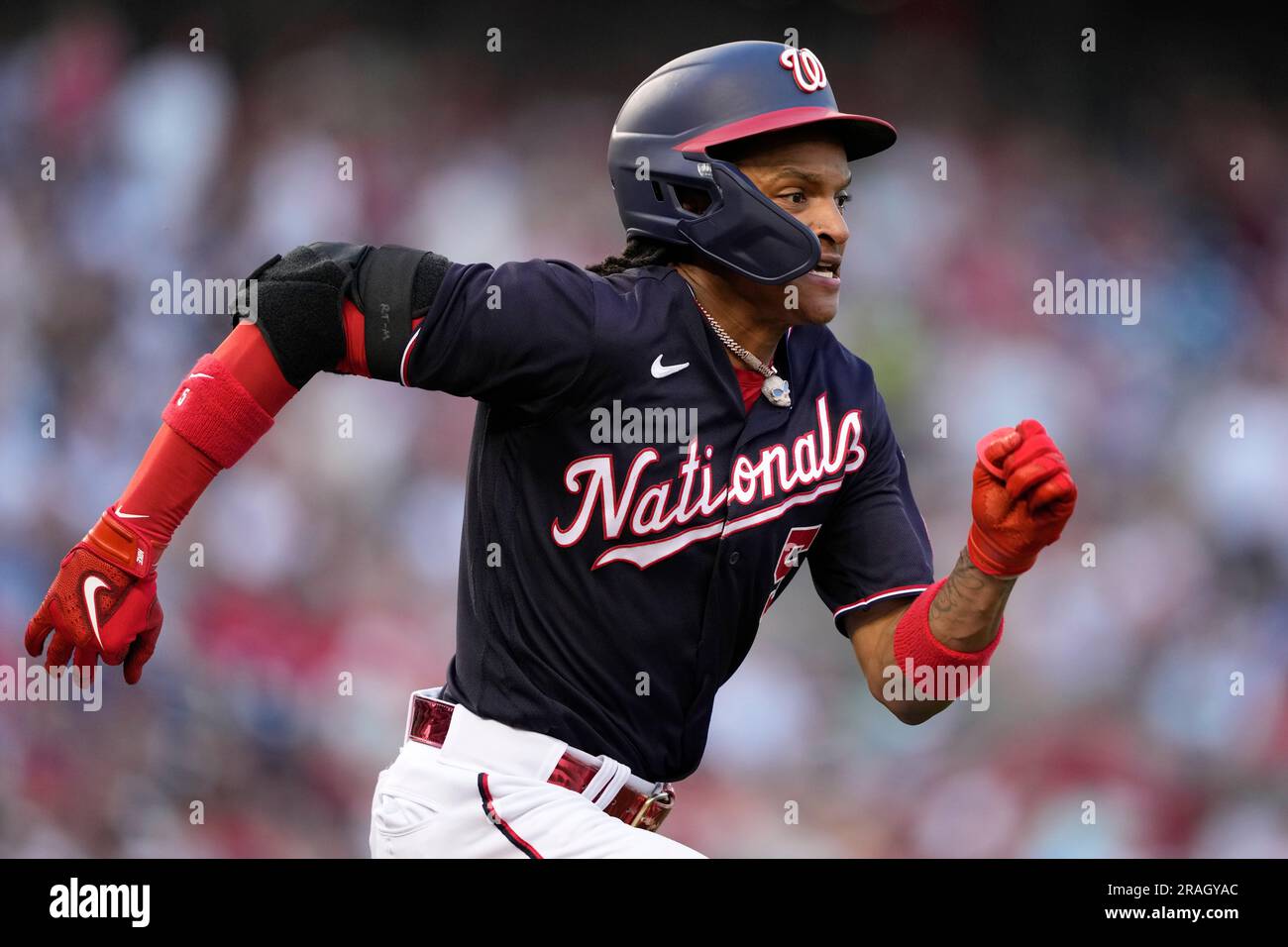 Washington Nationals' CJ Abrams rounds the bases after hitting a solo home  run during the third inning in the second game of a baseball doubleheader  against the St. Louis Cardinals Saturday, July