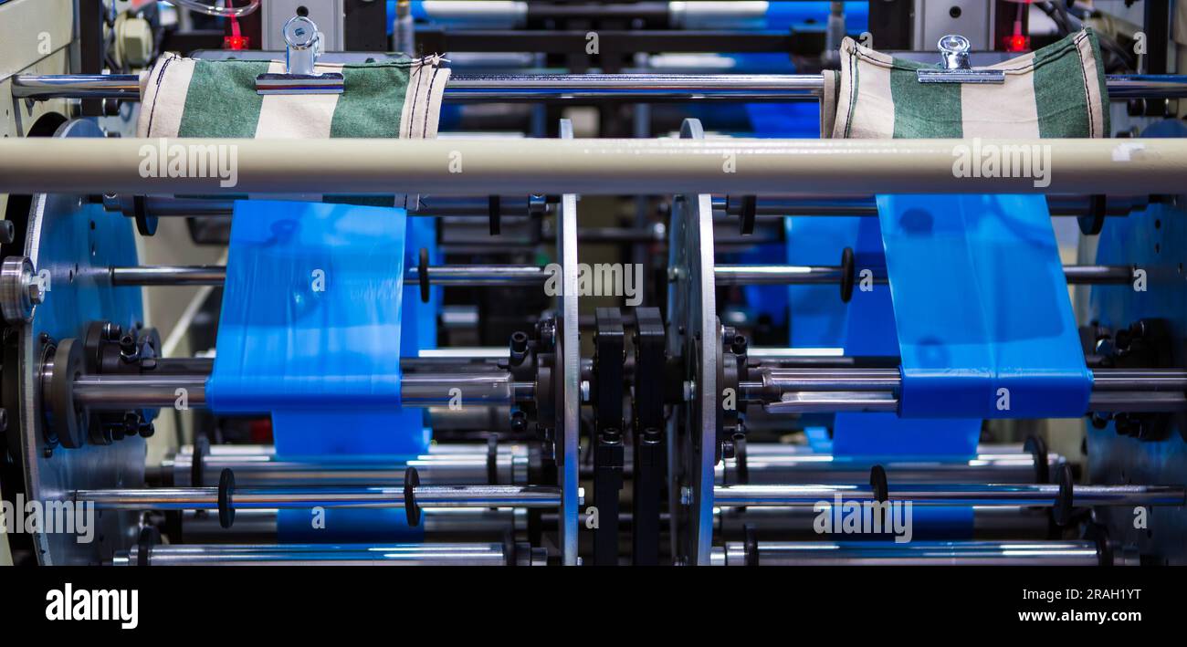 Process of plastic bag roll and cutting machine Stock Photo Alamy