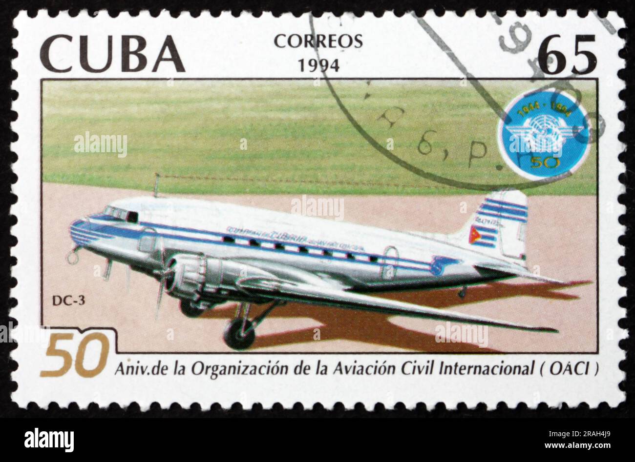 CUBA - CIRCA 1994: a stamp printed in Cuba shows DC-3 airplane, ICAO, 50th anniversary, circa 1994 Stock Photo