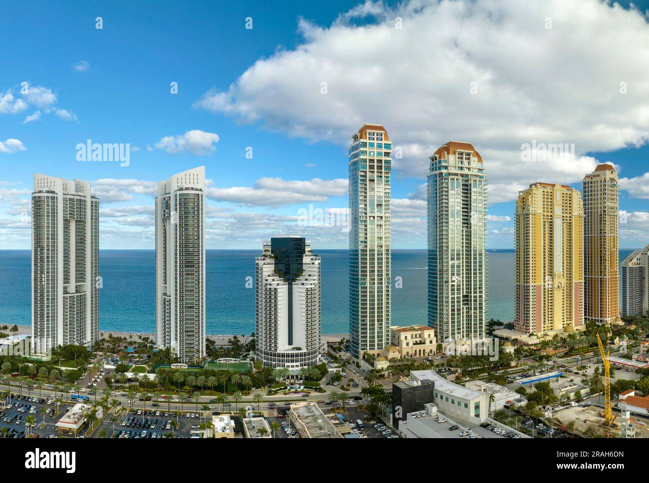 View of Aerial view of Sunny Isles Beach city with luxurious highrise hotels ...