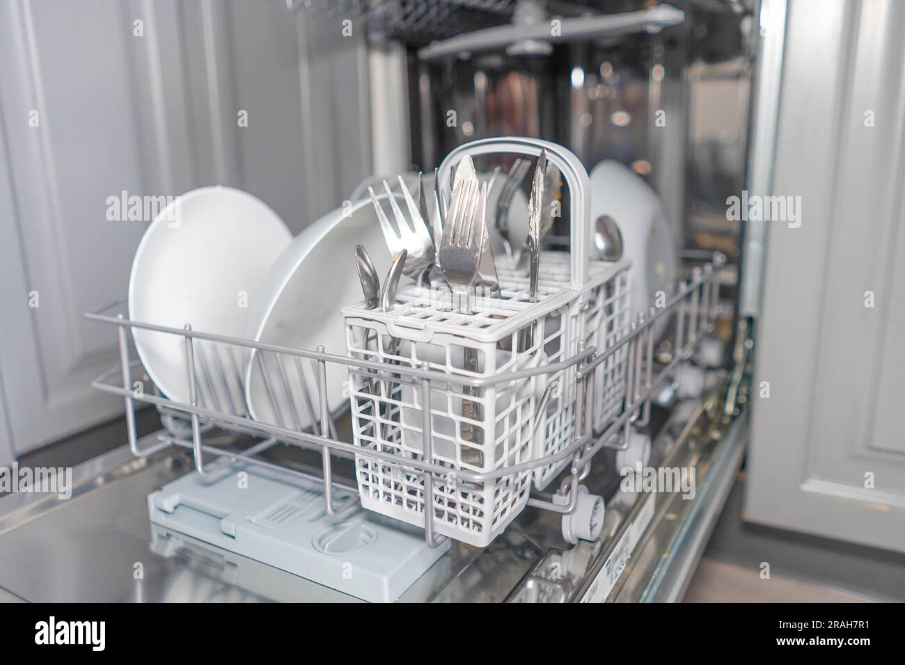 Dirty dishes in dishwasher in the kitchen Stock Photo Alamy
