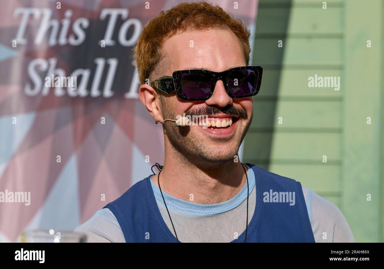 Potsdam, Germany. 02nd July, 2023. Kim de l'Horizon comes to the Potsdam Literature Festival LIT:Potsdam for a reading from his work 'Blood Book' in the garden of Villa Quandt. Credit: Jens Kalaene/dpa/Alamy Live News Stock Photo