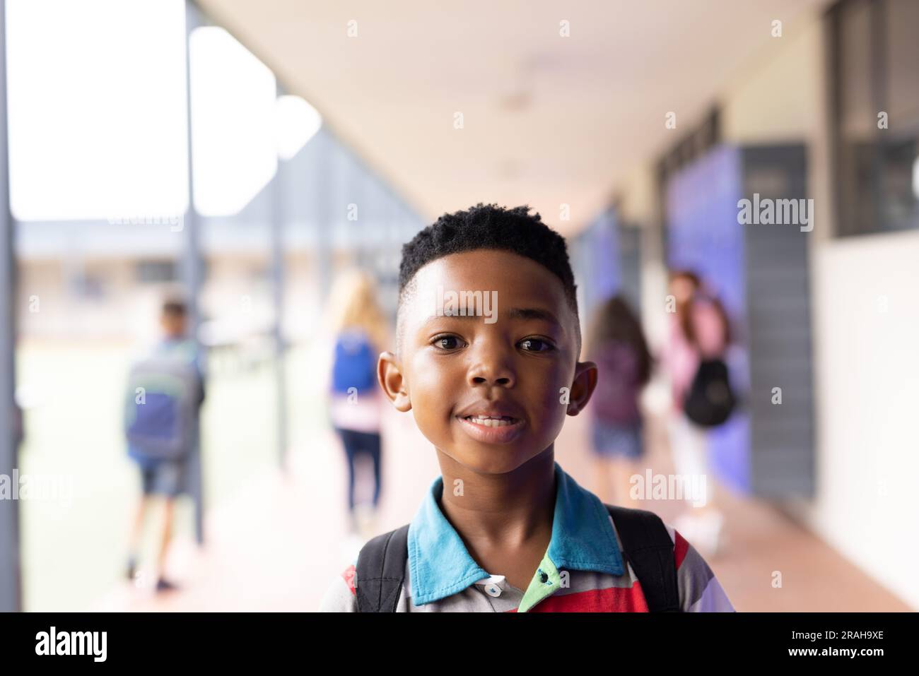 Portrait of smiling african american schoolboy in elementary school ...