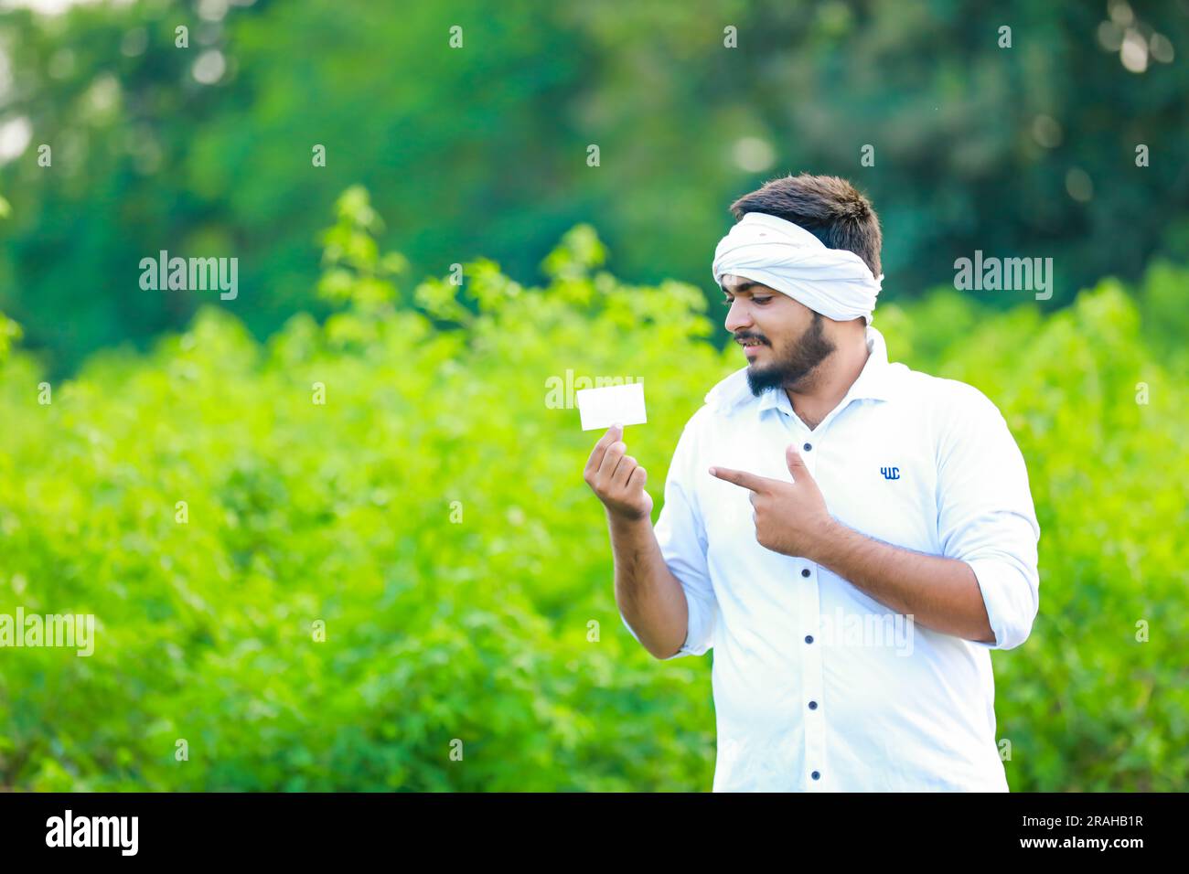 Farmer holding cotton india hi-res stock photography and images - Alamy