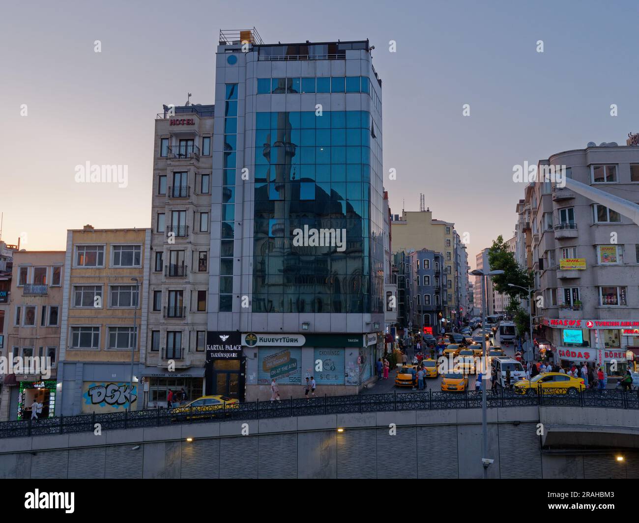 Yellow Taxis on a raised busy street close to Taksim Square on a summers evening Stock Photo
