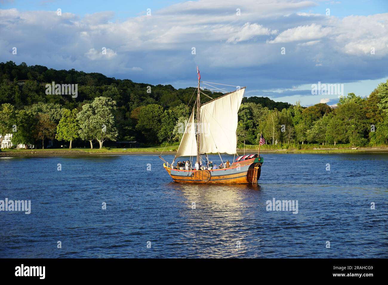 A modern replica of the Onrust, the first Dutch ship built in America in 1614, sails on the Connecticut River on a sunny fall day. Stock Photo