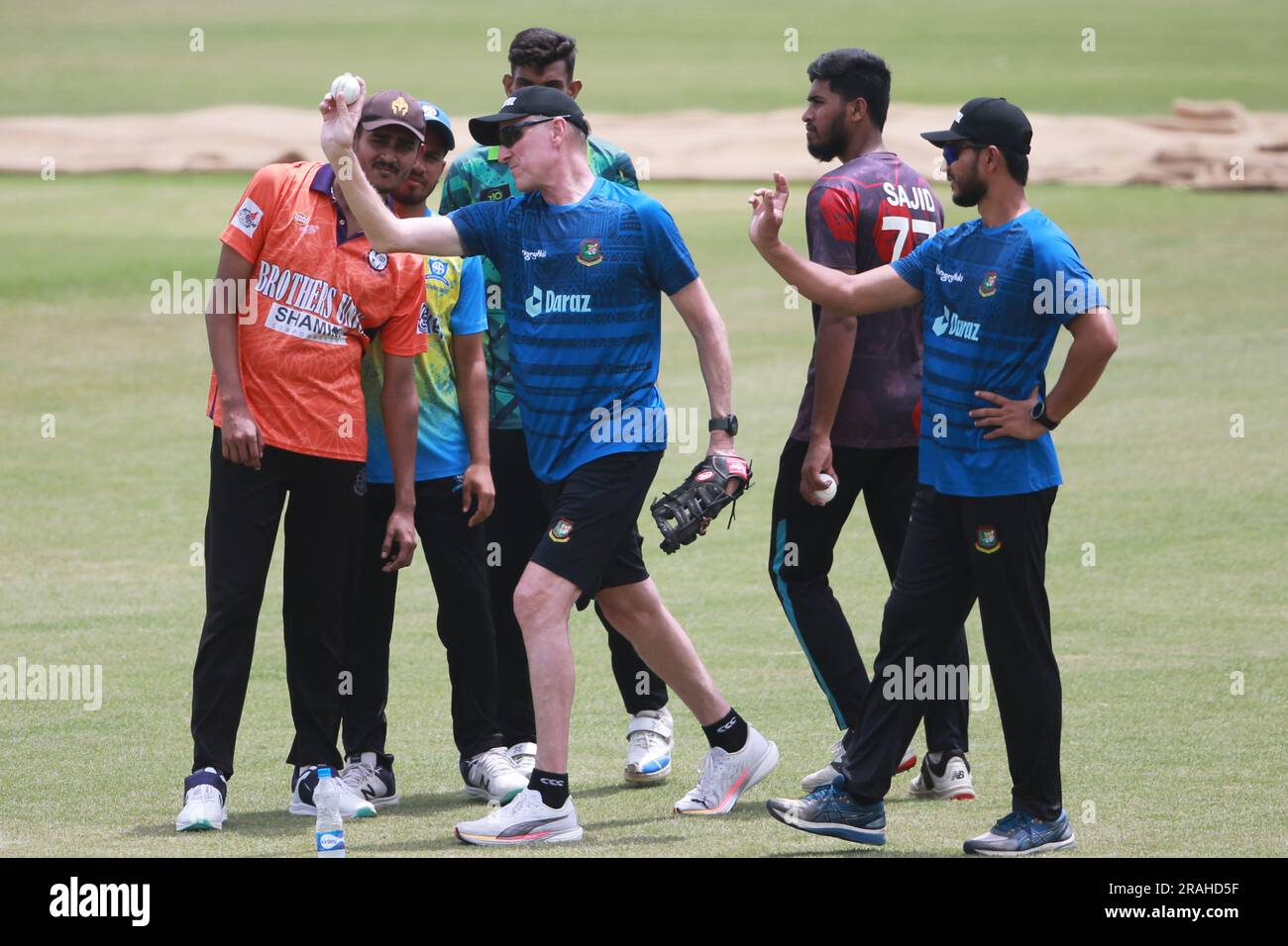 Bangladeshi fast bowling coach Allan Donald gives tips to net bowlers as Bangladeshi cricketers attend practice session at the Zahur Ahmed Chowdhury S Stock Photo