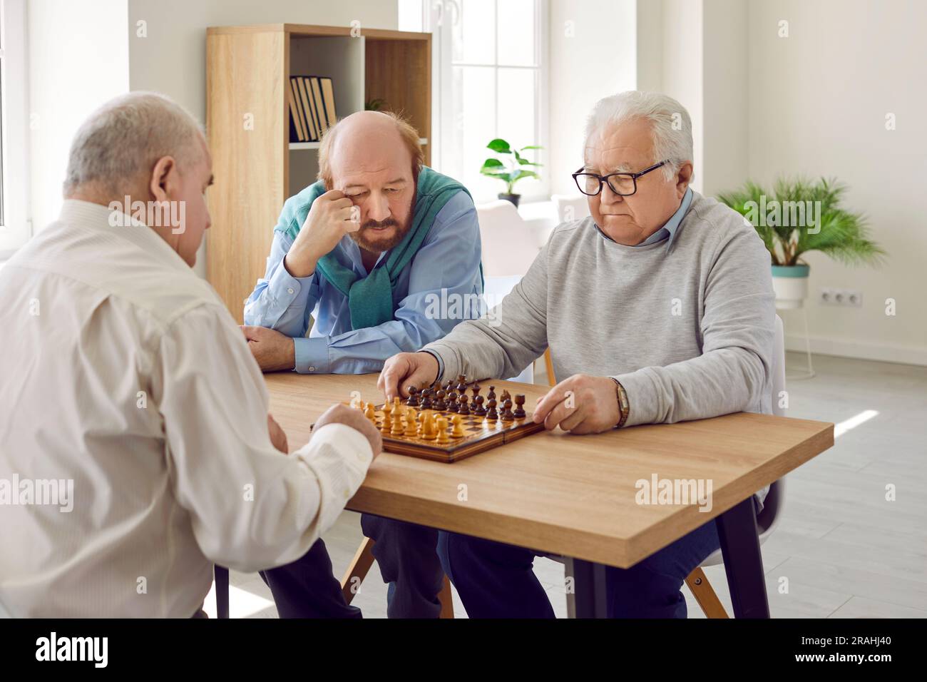 Local senior people play chess in the streets in the medieval city of  Sibiu.Transylvania.Romania Stock Photo - Alamy