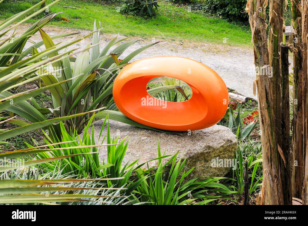 An outdoor sculpture called "Agent Orange" by Tom Leaper, Tremenheere