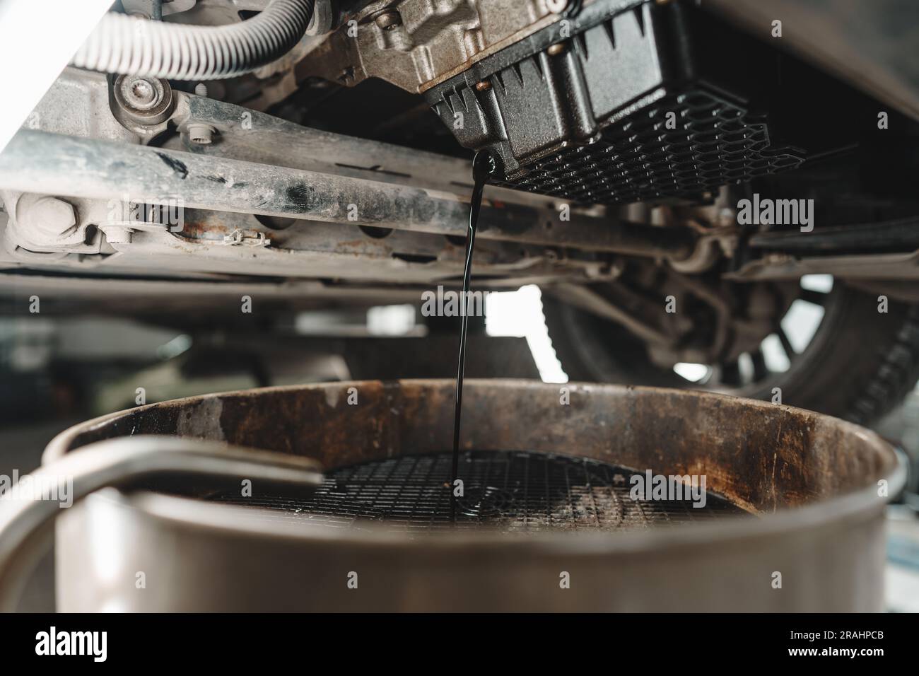 Process of oil change in a car service Stock Photo