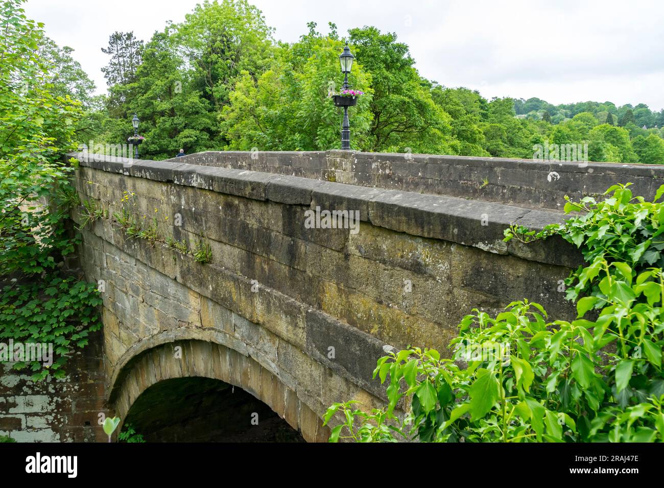 18th century stone built road bridge crossing the river nidd hires