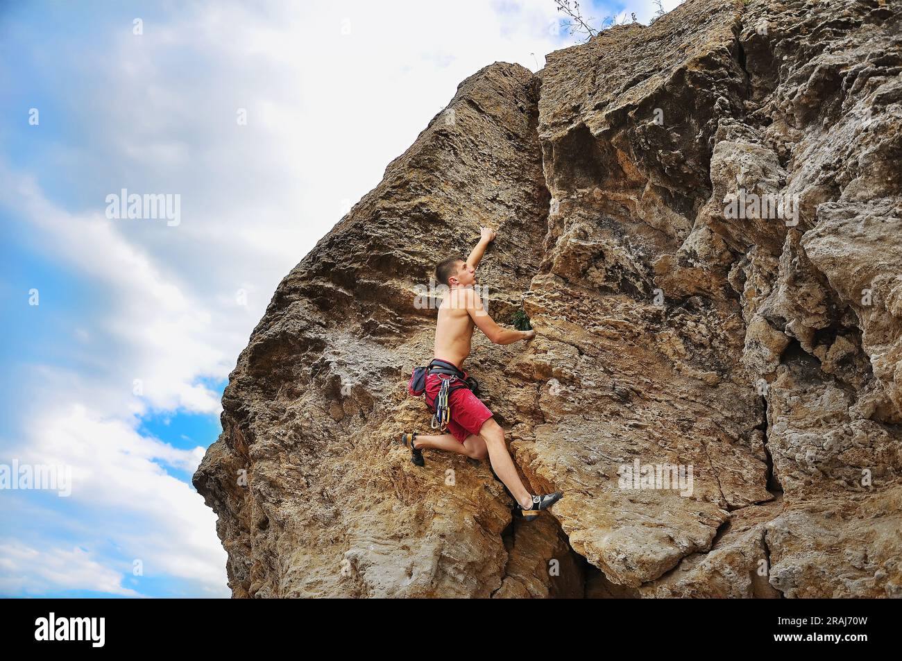 Man climbing on mountain hi-res stock photography and images - Alamy