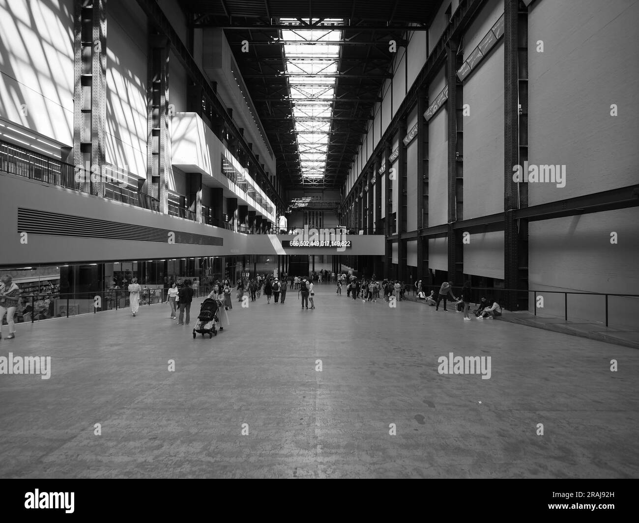 LONDON, UK - JUNE 08, 2023: Tate Modern turbine hall in South Bank power station in black and white Stock Photo