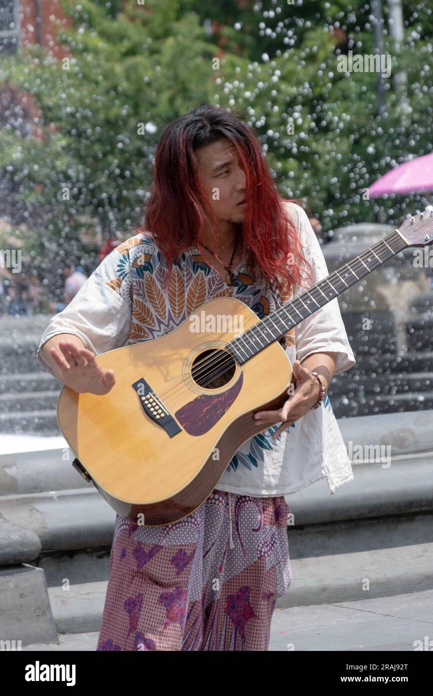 Osaka Vagabond is the solo project of Kotaro 'Vabo' Irishio. who is wandering the world to seek the truth. In Washington Square Park in NYC. Stock Photo