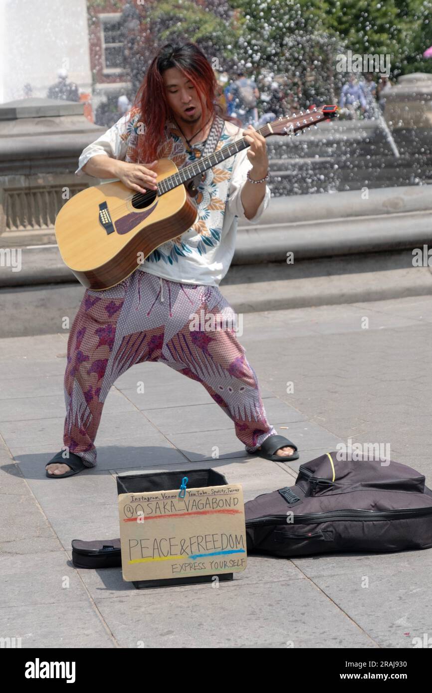 Osaka Vagabond is the solo project of Kotaro 'Vabo' Irishio. who is wandering the world to seek the truth. In Washington Square Park in NYC. Stock Photo