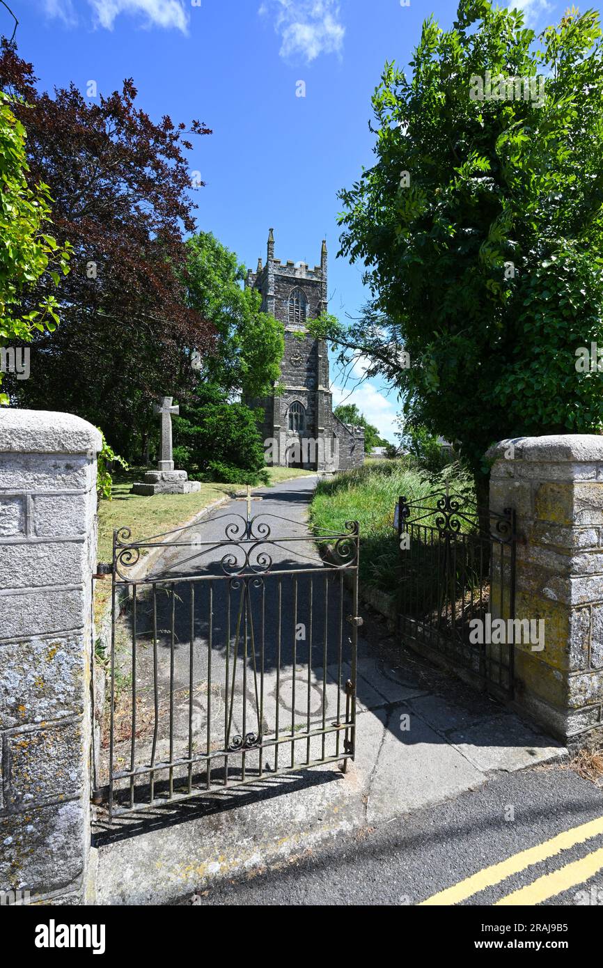 ST NEWLYN EAST CHURCH AND GRAVE YARD WITH HEADSTONES AND PATH LINE WITH GRAVE STONES Stock Photo