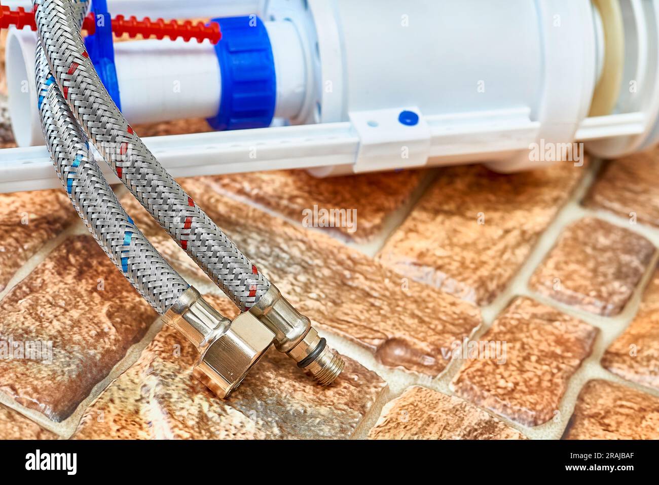 Plumbing. Flexible metal steel faucet hoses, flush mechanism, siphon