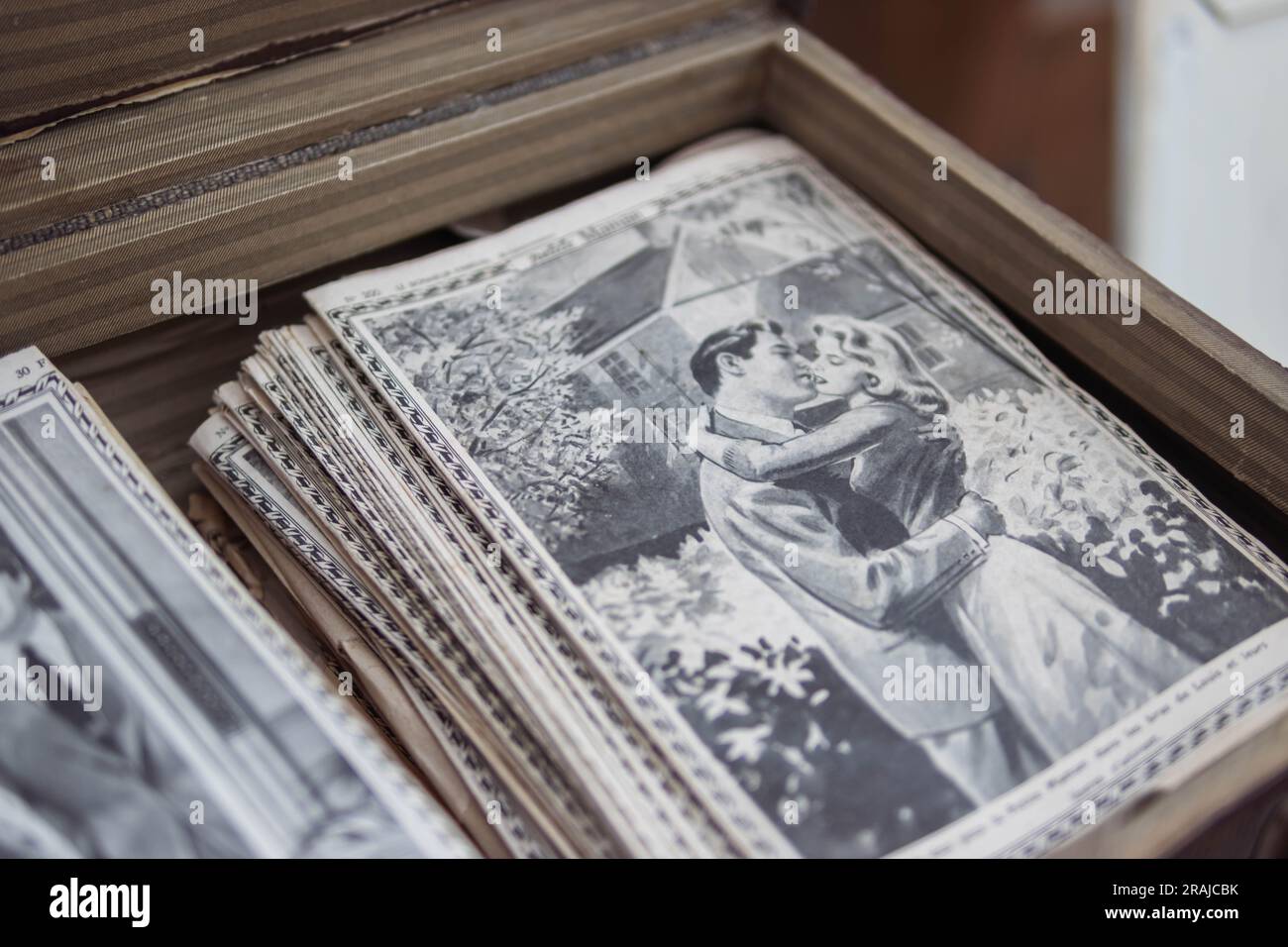 antique magazines are sold at the fair. there is a place for an inscription on the side Stock Photo