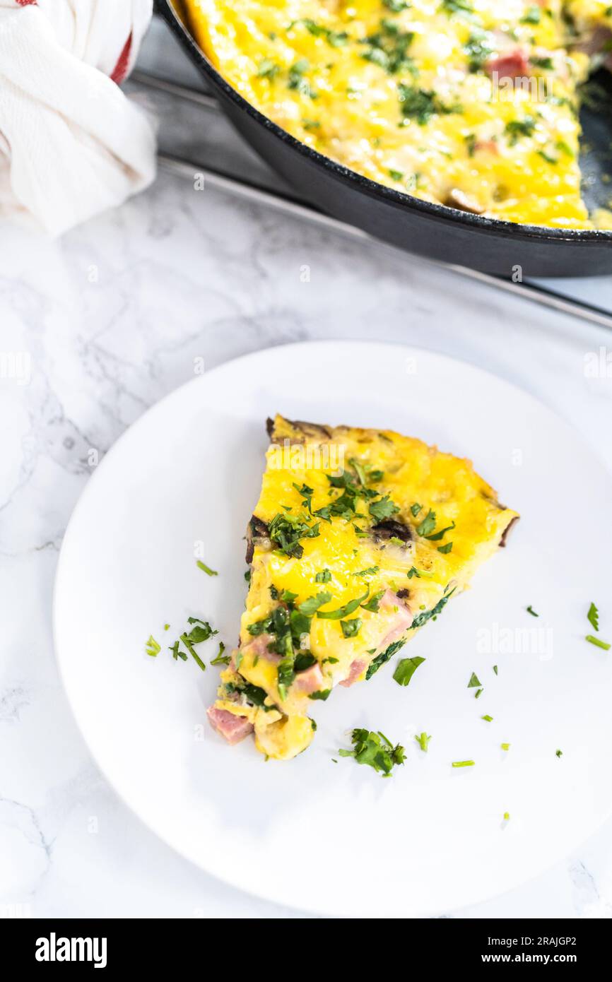 Spinach and ham frittata Stock Photo Alamy