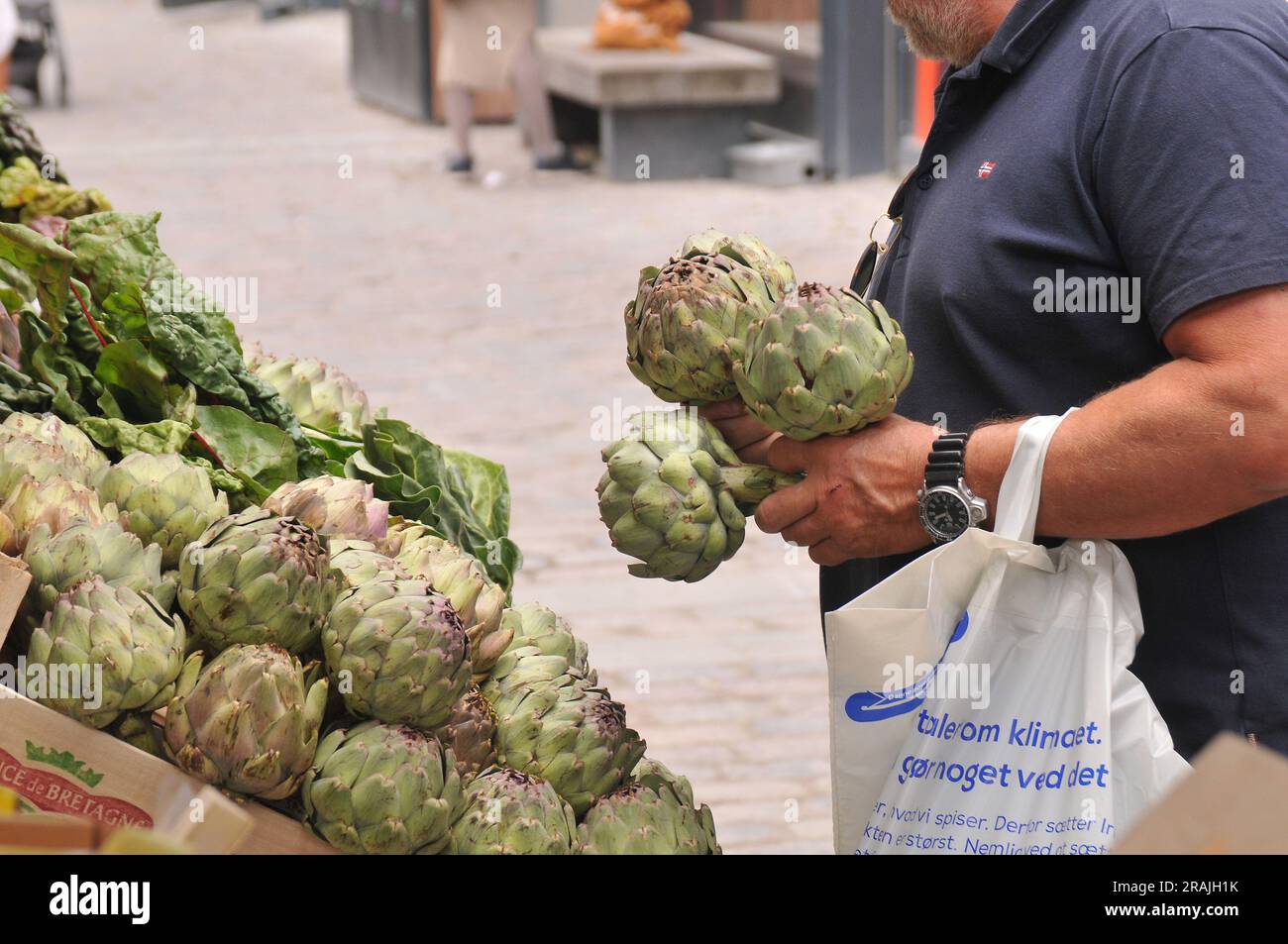 04 July 2023/ Vegetable and fruit shoppers at farmers market in danish