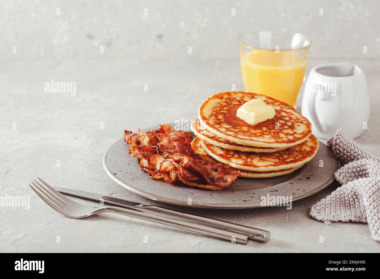 sweet pancakes with butter and bacon. traditional american breakfast Stock Photo