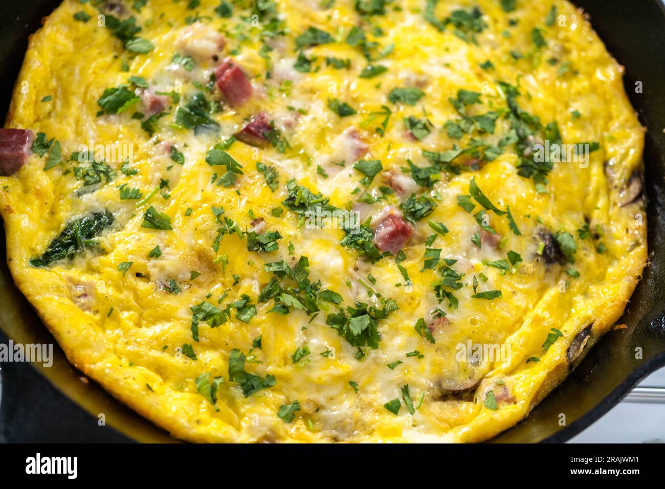 Spinach and ham frittata Stock Photo - Alamy