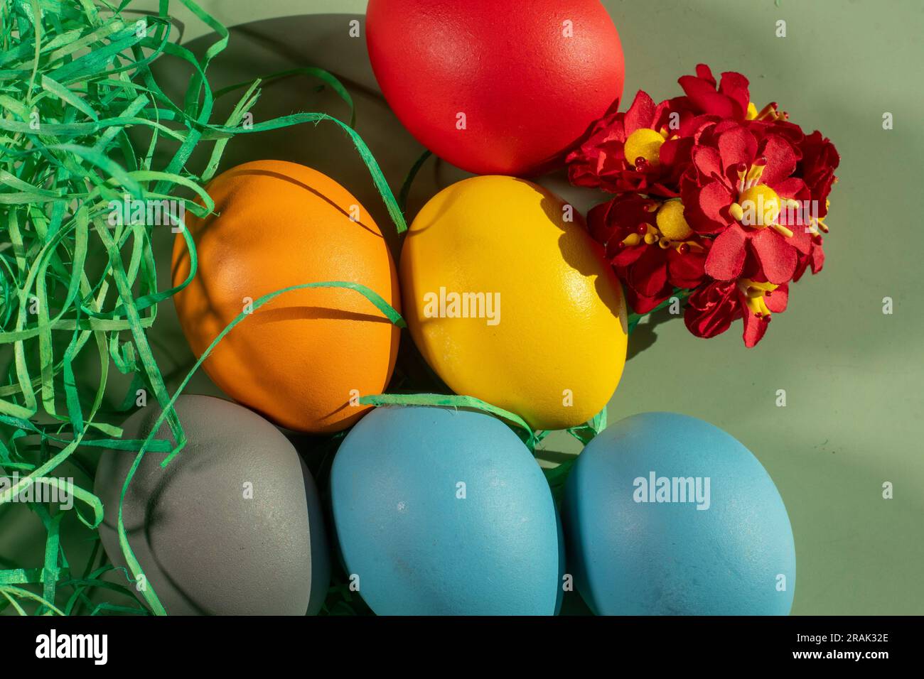 colorful eggs symbolize easter. Easter minimal concept. Creative Happy Easter, spring layout. Stock Photo