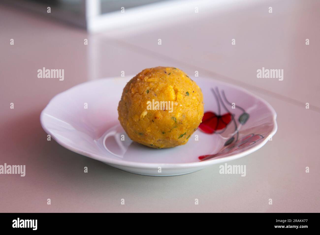 Ripe green bellaco banana balls. This food usually accompanies dishes from the Peruvian jungle such as the famous Tacacho. Stock Photo