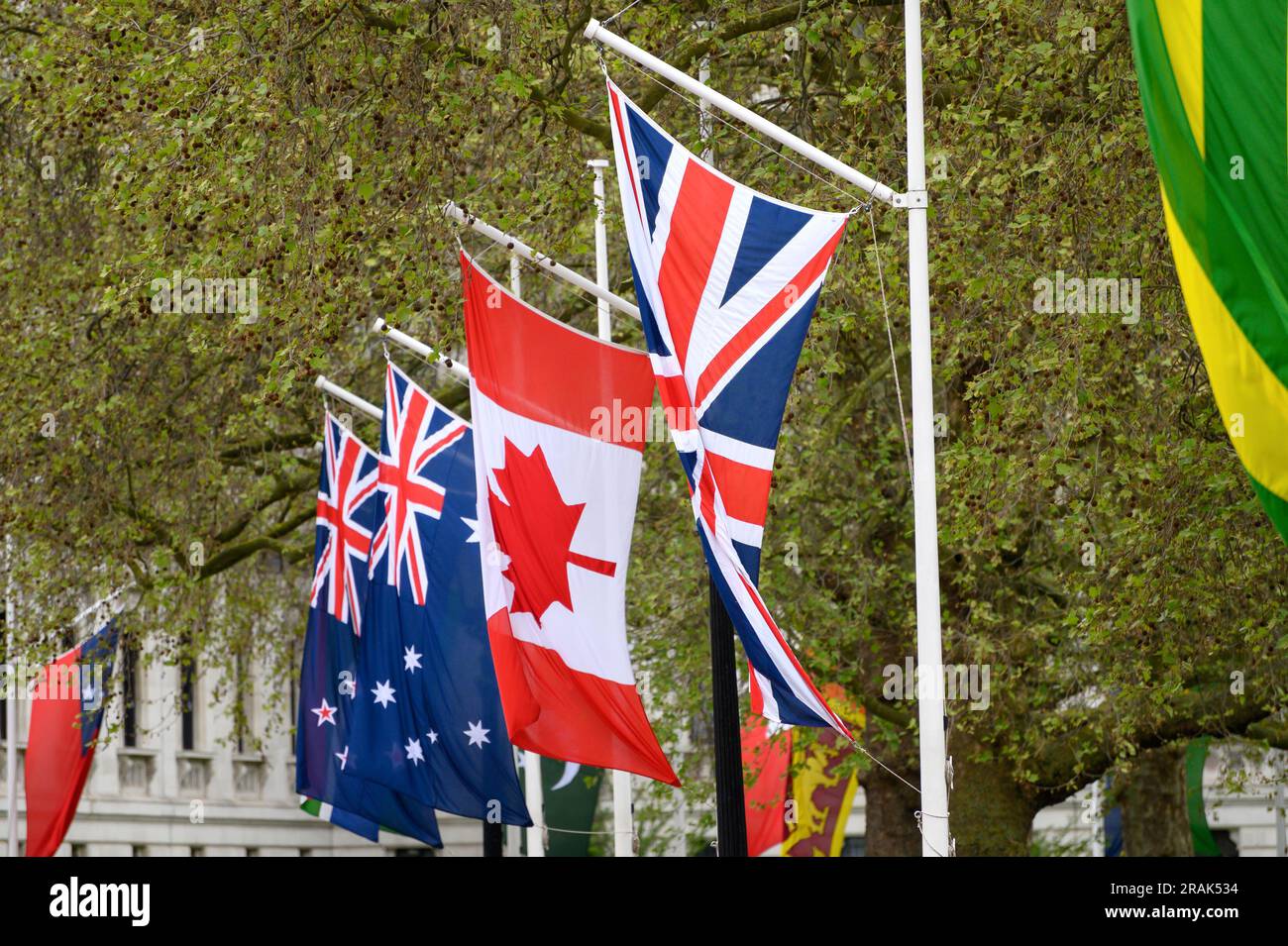 London, UK. Flags of the UK, Canada, Australia and New Zealand flying on Horse Guards Road, Westminster Stock Photo
