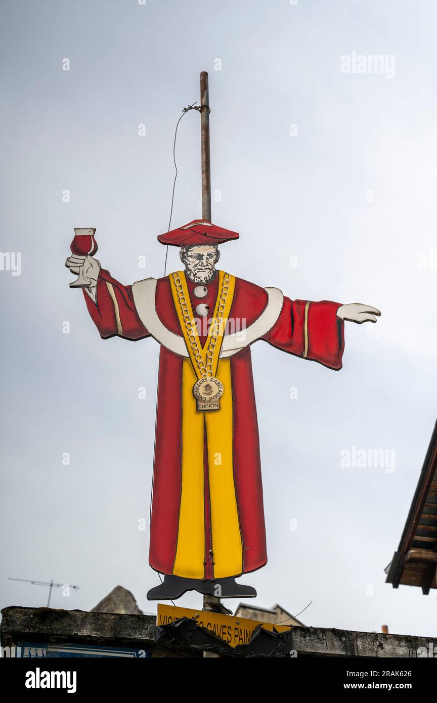 An effigy of a man dressed in medieval clothes advertising the Entonneurs Rabelaisiens Chinon, in Chinon, Loire Valley France Stock Photo