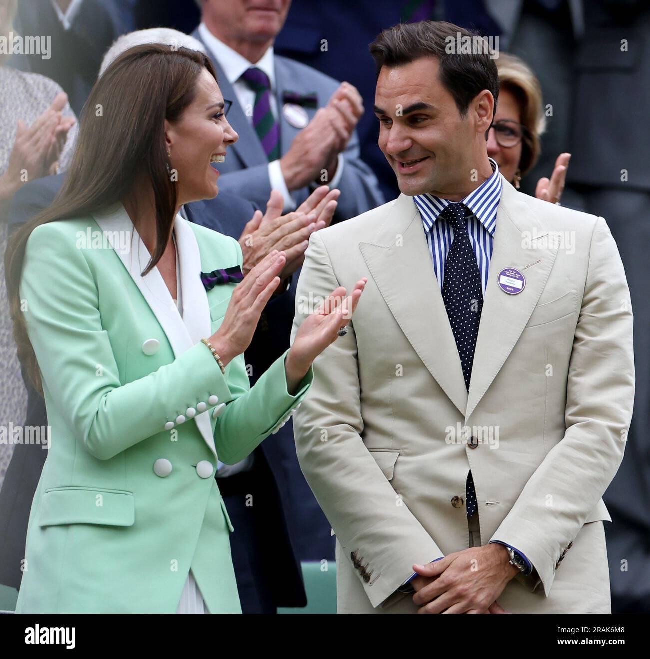 London, Britain. 4th July, 2023. Roger Federer (R) talks to Britain's Catherine, Princess of Wales, at Centre Court ahead of play on Day 2 of Wimbledon Tennis Championships in London, Britain, July 4, 2023. Credit: Li Ying/Xinhua/Alamy Live News Stock Photo