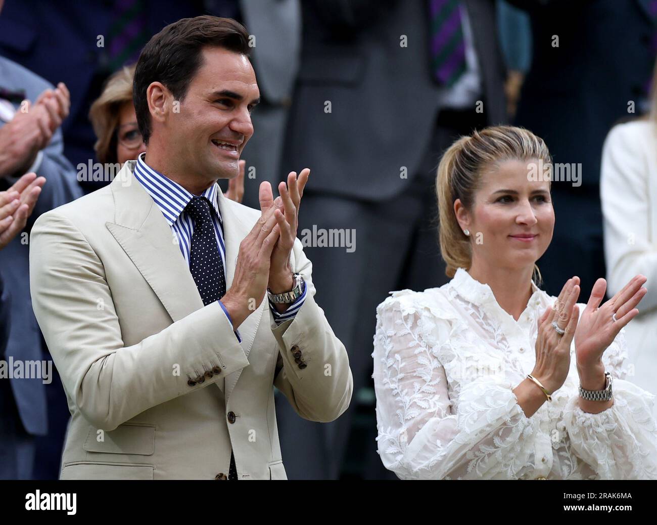 London, Britain. 4th July, 2023. Roger Federer (L) and his wife Mirka Federer applaud at Centre Court ahead of play on Day 2 of Wimbledon Tennis Championships in London, Britain, July 4, 2023. Credit: Li Ying/Xinhua/Alamy Live News Stock Photo
