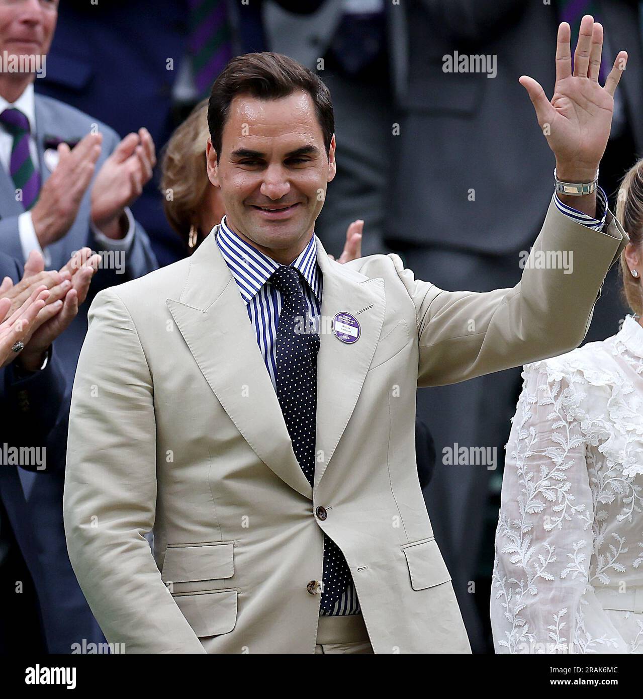 London, Britain. 4th July, 2023. Roger Federer waves to the spectators at Centre Court ahead of play on Day 2 of Wimbledon Tennis Championships in London, Britain, July 4, 2023. Credit: Li Ying/Xinhua/Alamy Live News Stock Photo