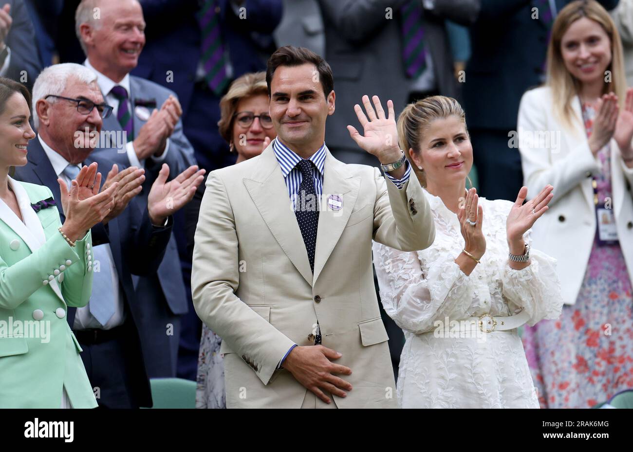 London, Britain. 4th July, 2023. Roger Federer (front C) stands with his wife Mirka Federer (front R) at Centre Court ahead of play on Day 2 of Wimbledon Tennis Championships in London, Britain, July 4, 2023. Credit: Li Ying/Xinhua/Alamy Live News Stock Photo