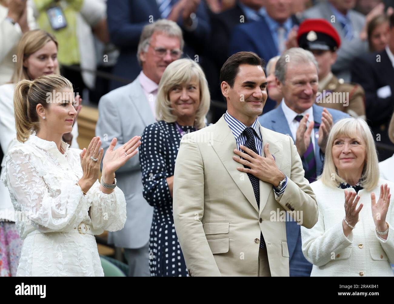 London, Britain. 4th July, 2023. Roger Federer (front C) and his wife Mirka Federer (front L) are seen at Centre Court ahead of play on Day 2 of Wimbledon Tennis Championships in London, Britain, July 4, 2023. Credit: Han Yan/Xinhua/Alamy Live News Stock Photo