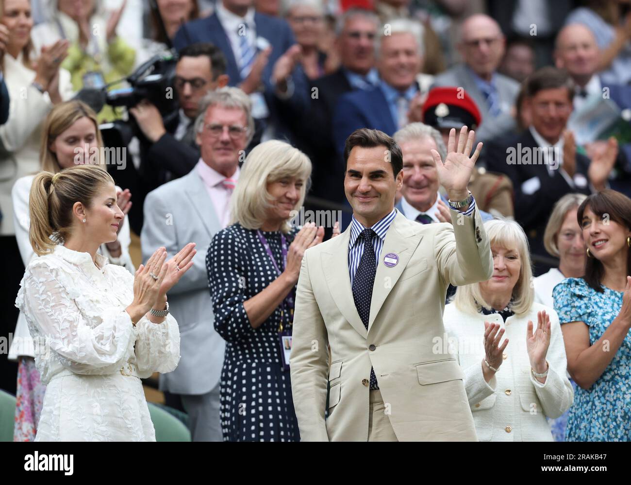 London, Britain. 4th July, 2023. Roger Federer (front R) waves to spectators at Centre Court ahead of play on Day 2 of Wimbledon Tennis Championships in London, Britain, July 4, 2023. Credit: Han Yan/Xinhua/Alamy Live News Stock Photo
