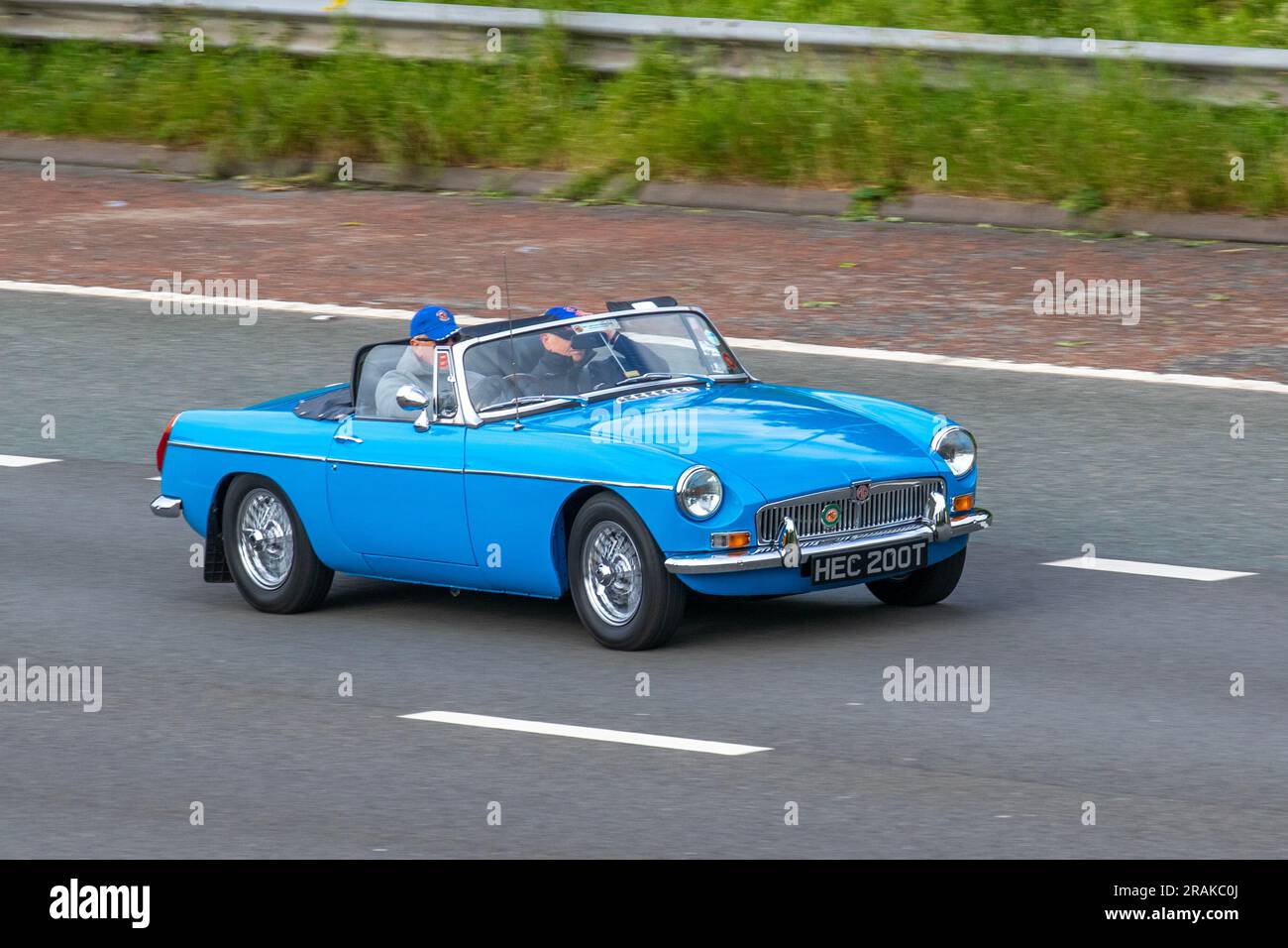 1978 70s seventies MG B cabriolet; travelling at speed on the M6 motorway in Greater Manchester, UK Stock Photo