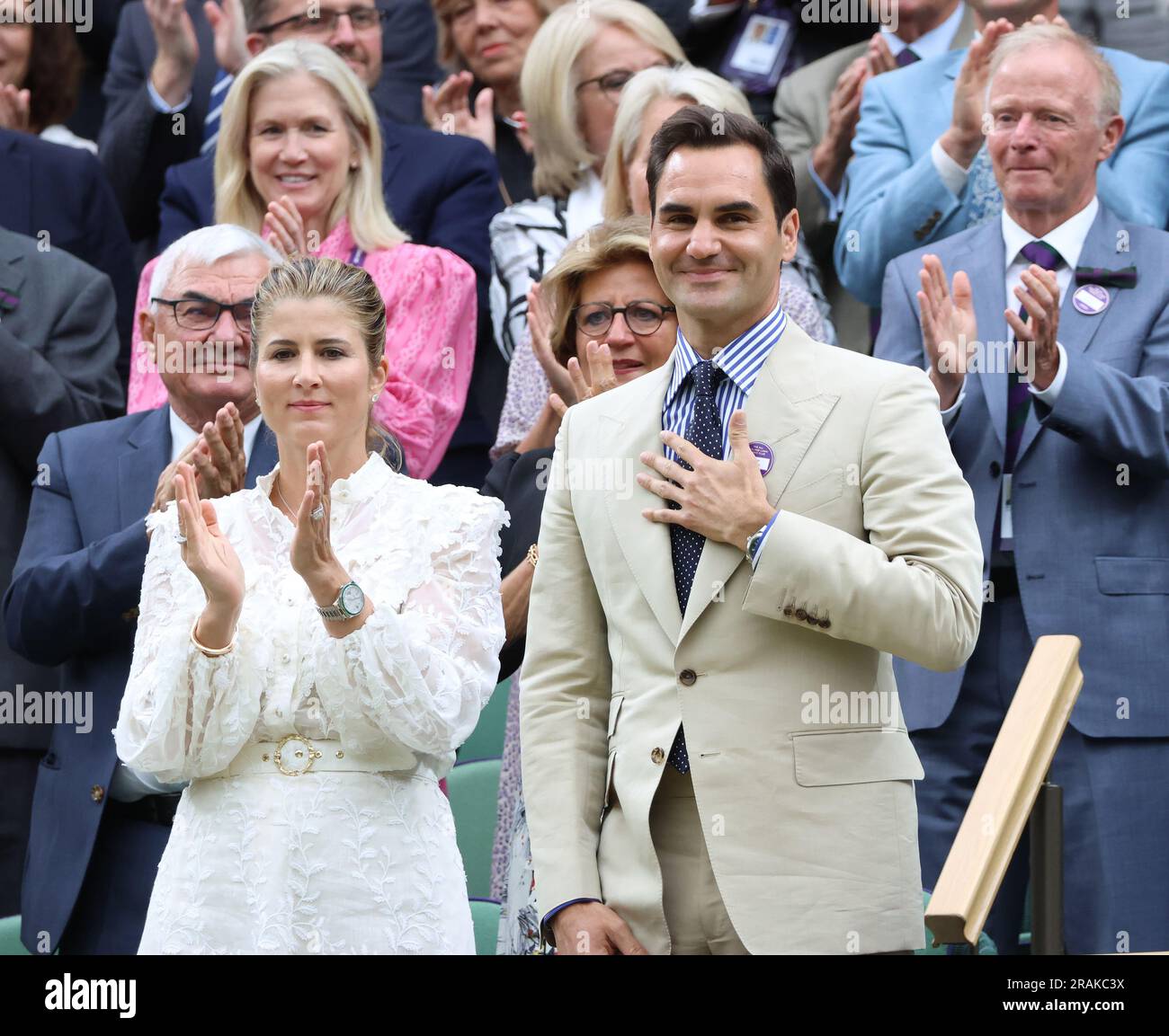 London, UK. 04th July, 2023. Swiss tennis champion Roger Federer with his wife Mirka wave after being honoured in the Royal box on centre court on day two of the 2023 Wimbledon championships in London on Tuesday, July 04, 2023. Photo by Hugo Philpott/UPI Credit: UPI/Alamy Live News Stock Photo