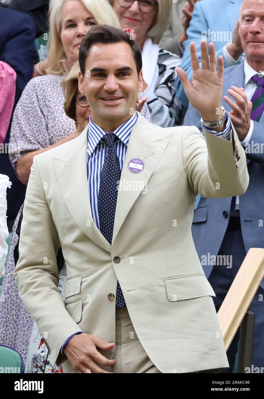 London, UK. 04th July, 2023. Swiss tennis champion Roger Federer waves after being honoured in the Royal box on centre court on day two of the 2023 Wimbledon championships in London on Tuesday, July 04, 2023. Photo by Hugo Philpott/UPI Credit: UPI/Alamy Live News Stock Photo