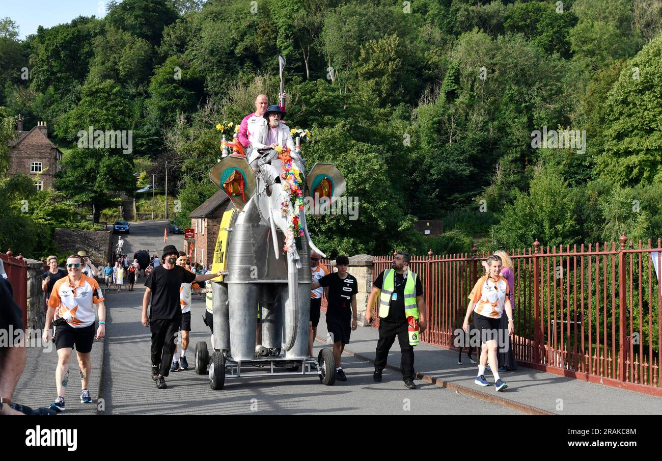 The Commonwealth Games Queen's Baton Relay crossing the Ironbridge on a