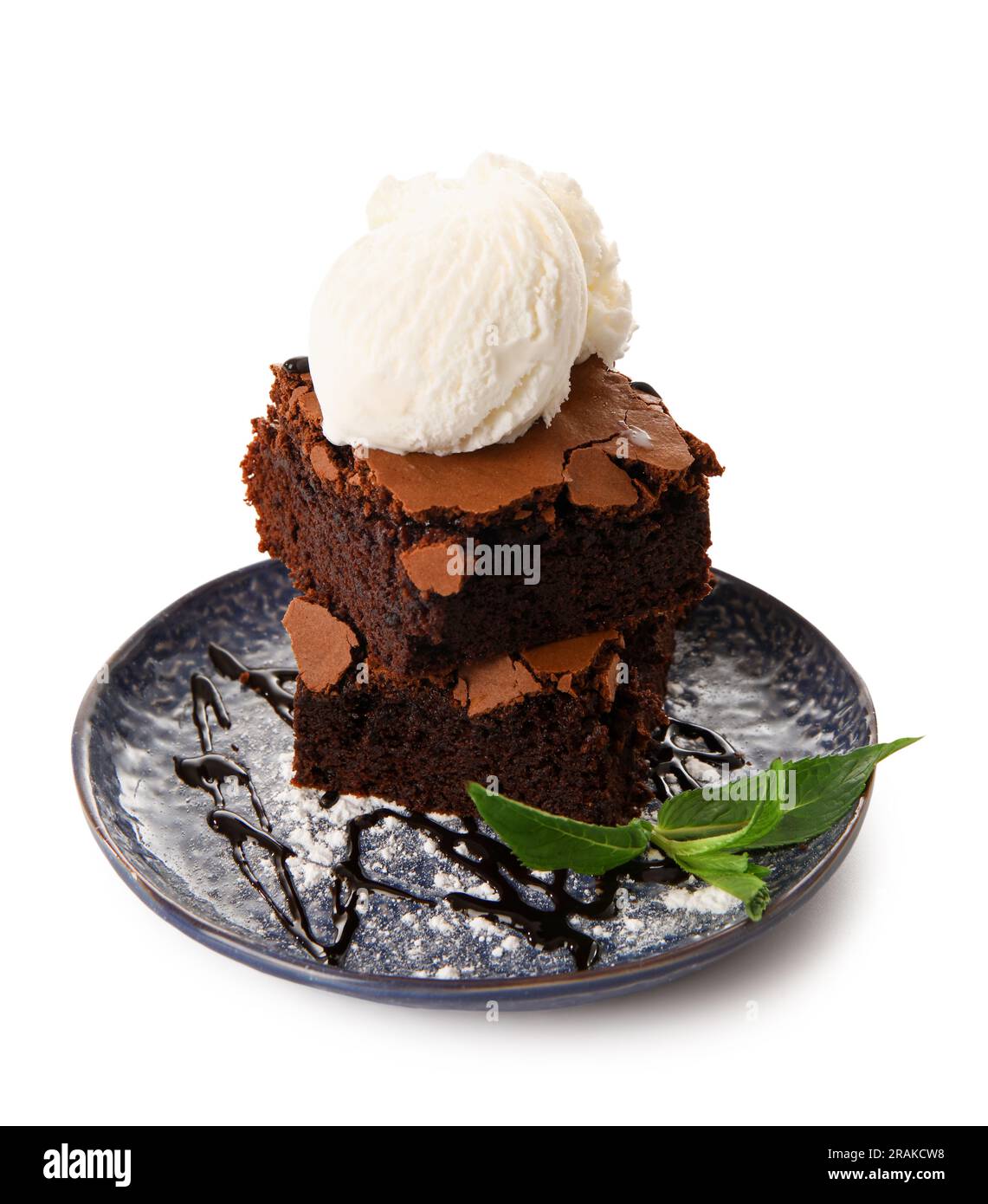 Plate with pieces of tasty chocolate brownie and ice cream on white ...