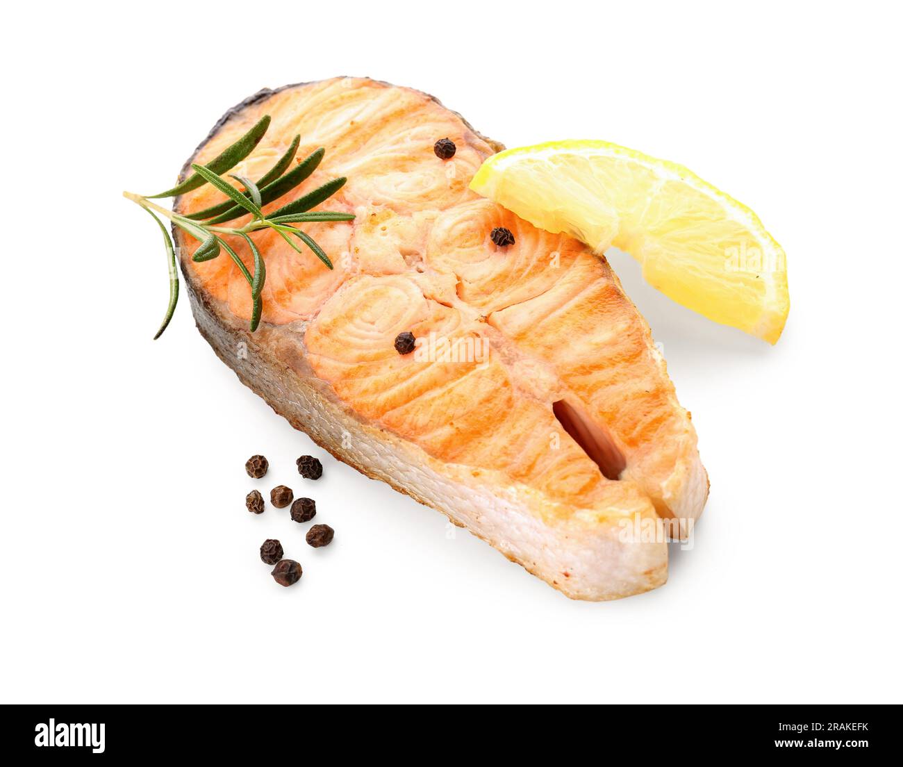 Tasty grilled salmon steak with lemon on white background Stock Photo ...