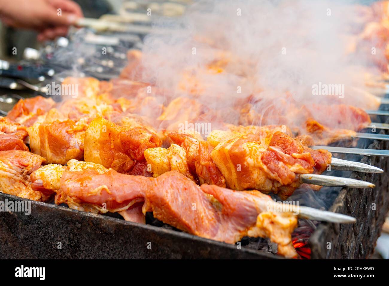 Traditional georgian mtsvadi, grill on the coals with smoke. Shashlik