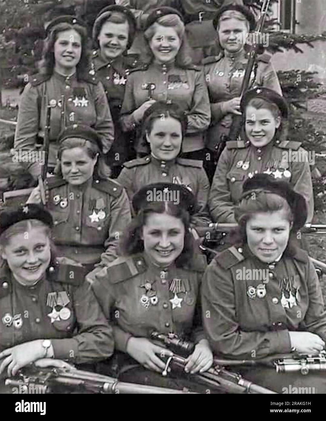 RUSSIAN ARMY FEMALE SNIPERS about 1944. Front row from left: Senior non-commissioned officer V.N. Stepanova ((20 kills), Senior non-commissioned officer Y.P. Belousova (80 kills), Senior non-commissioned officer  A.E.Vinogradova (83 kills). Photo: SIB Stock Photo
