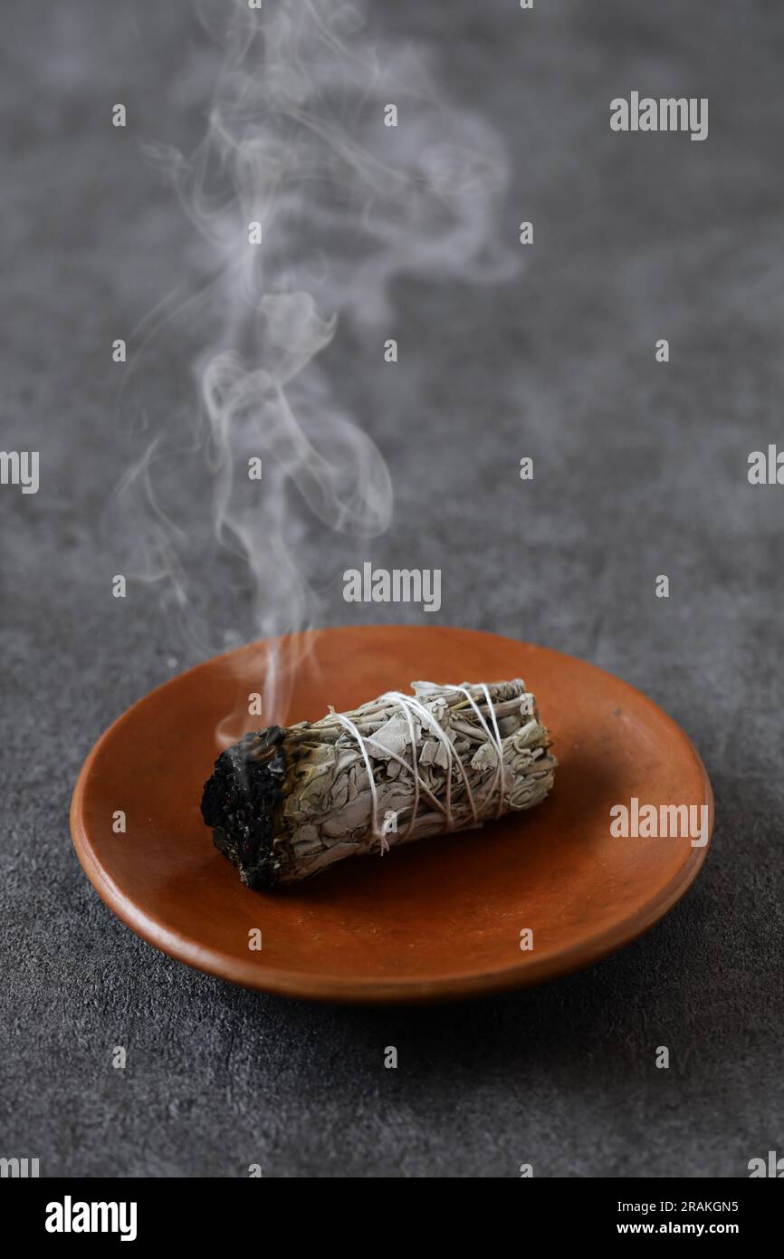 white sage smudge stick for meditation, healing, and spiritual room cleansing Stock Photo