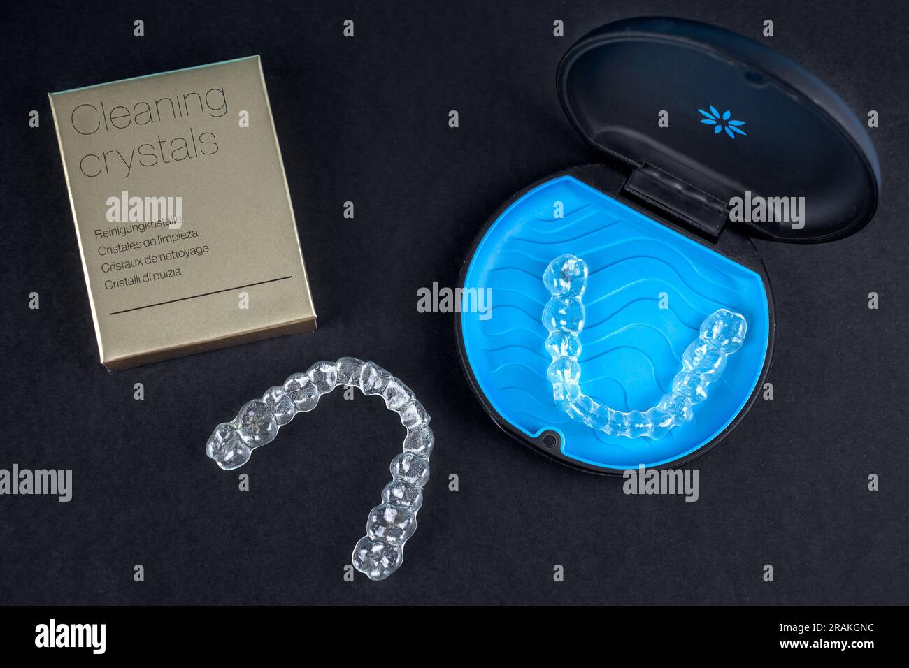 Invisible retainers case with orthodontic aligner brackets top view