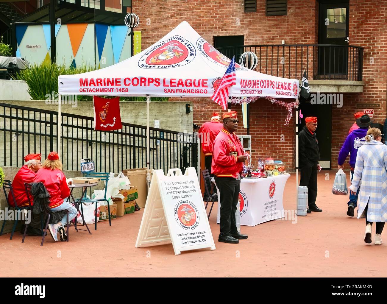 Fund raising stand manned by veterans from the Marine Corps League Detachment 1458 in Ghirardelli Square Marina District San Francisco California USA Stock Photo